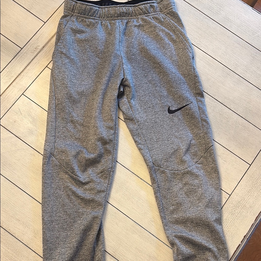 Nike Gray Sweatpants with Tapered Leg and Elastic Cuffs